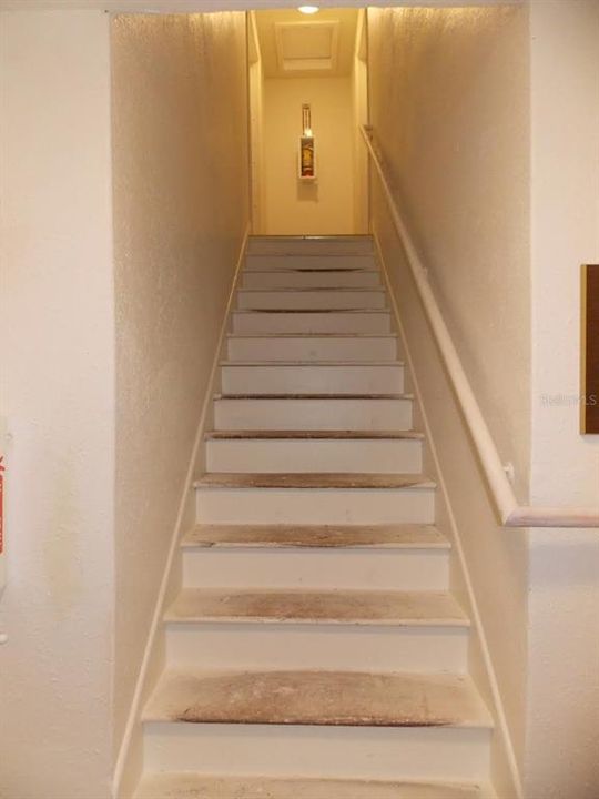Interior stairwell.  (Each unit has unit access via interior stairwell or via exterior entry / exit door).