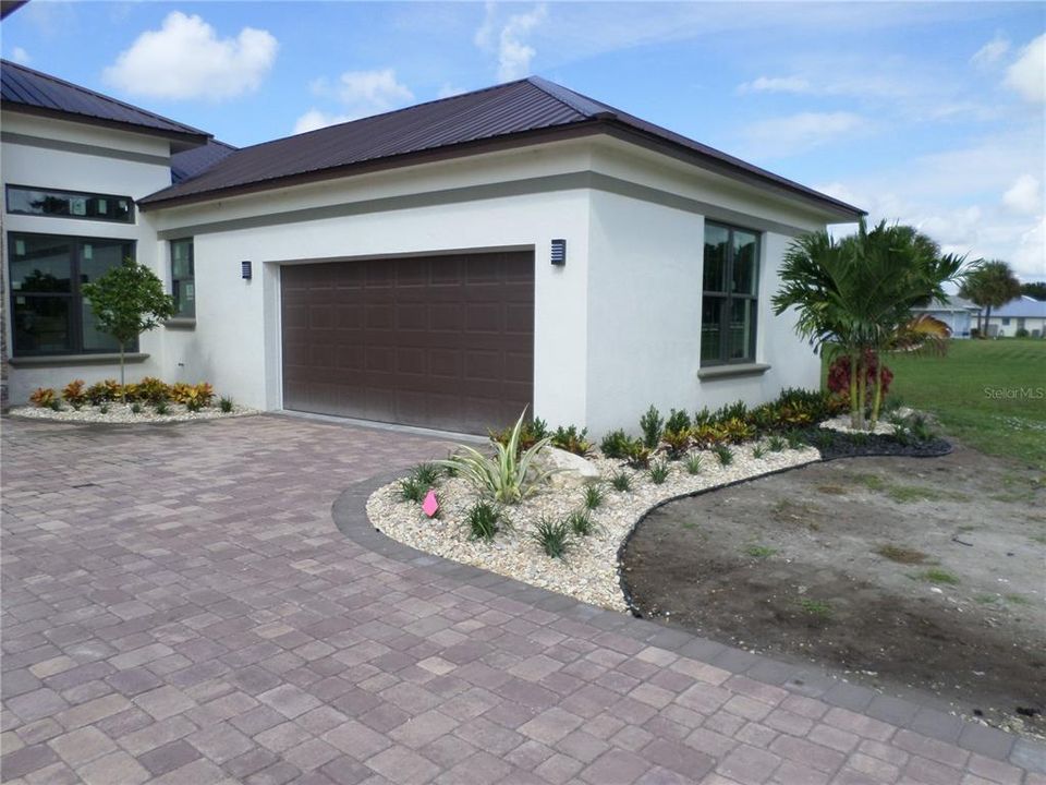 BEAUTIFULLY LANDSCAPTED WITH PAVER DRIVE