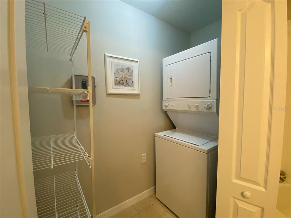 Upstairs Laundry Closet with storage