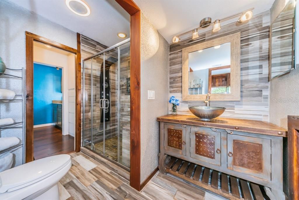 Third story quality Bathroom with shower, shared by two Bedrooms on this level