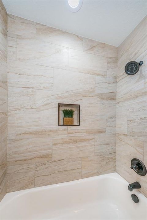 Bathroom 3 is a tub shower combo