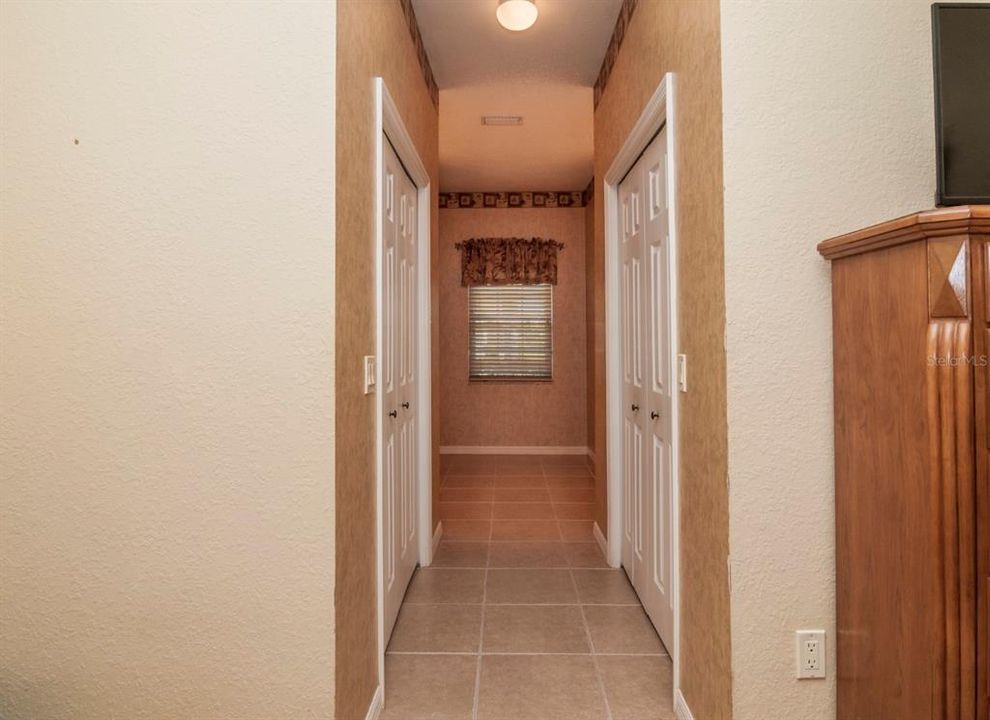 The hallway that connect the master bedroom to the master bath holds the 2 walk in closets.
