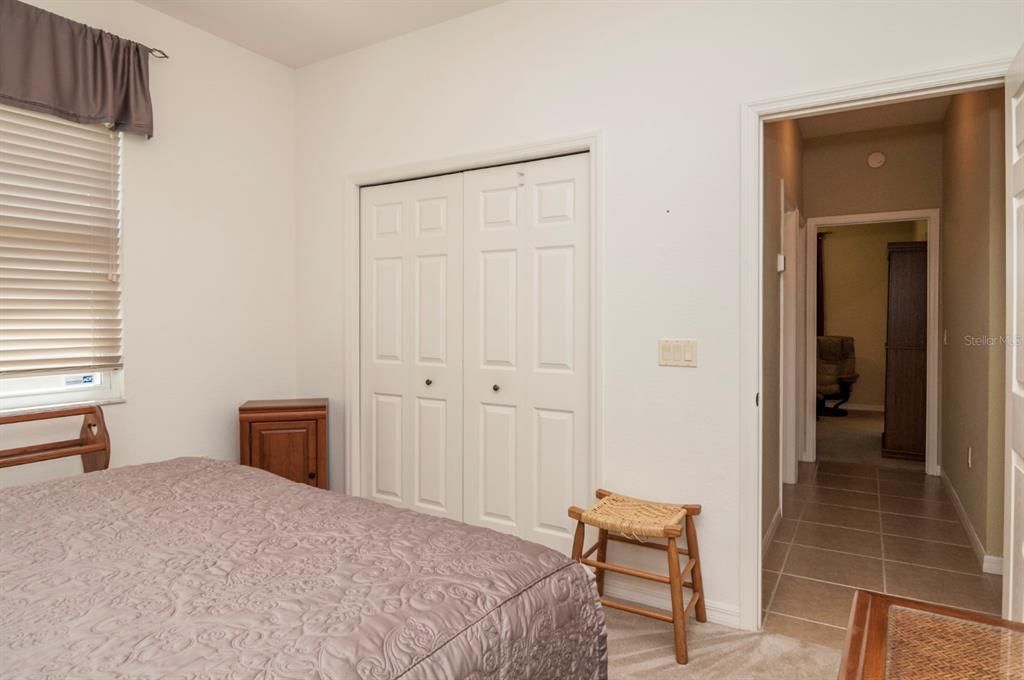 The second bedroom has quality carpeting and a reach in closet. The hallway that connects the 2 guest bedrooms is the home to the guest bath.