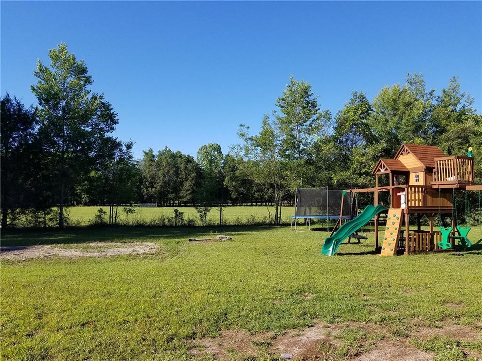 Playset to right of home will stay!