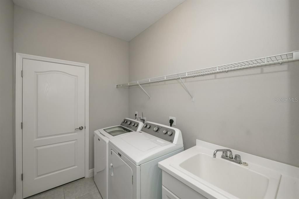 Laundry room with utility sink