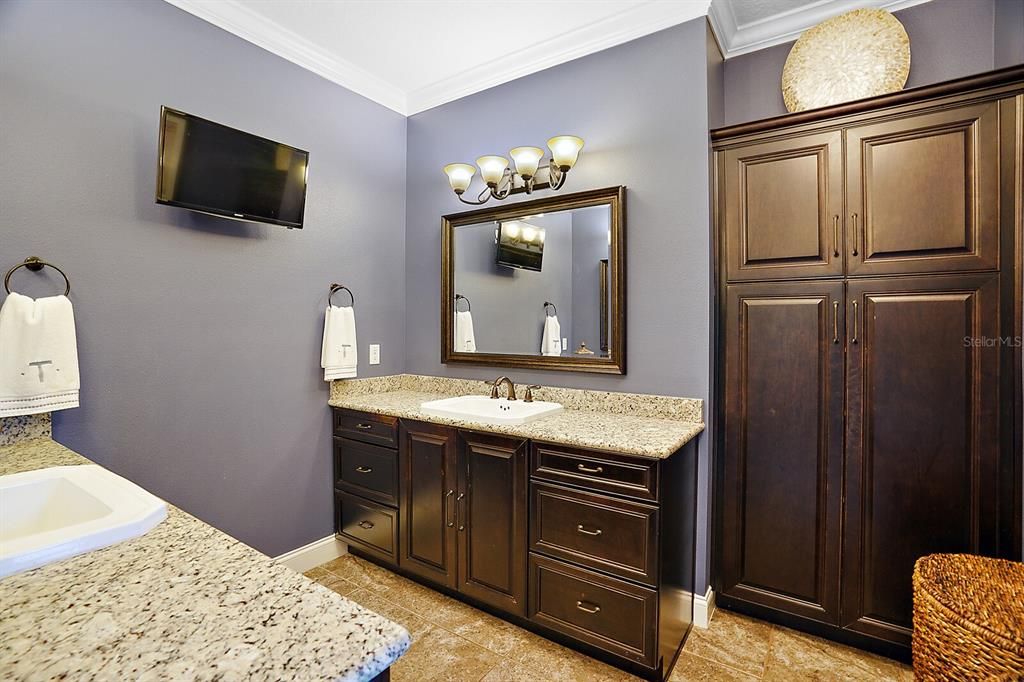 Master Bathroom with Crown Molding and Custom Cabinets