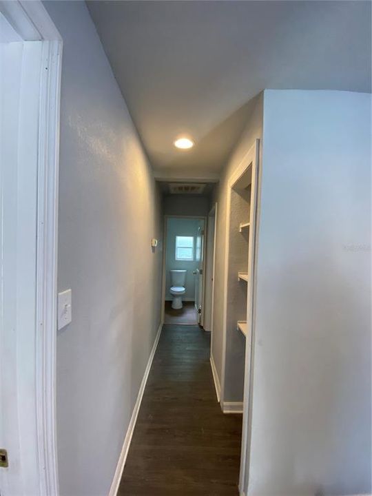 Hallway Leading to Bedrooms and Bathroom