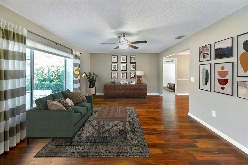 Formal living area has tons of natural light and large oversized window.Virtually staged.