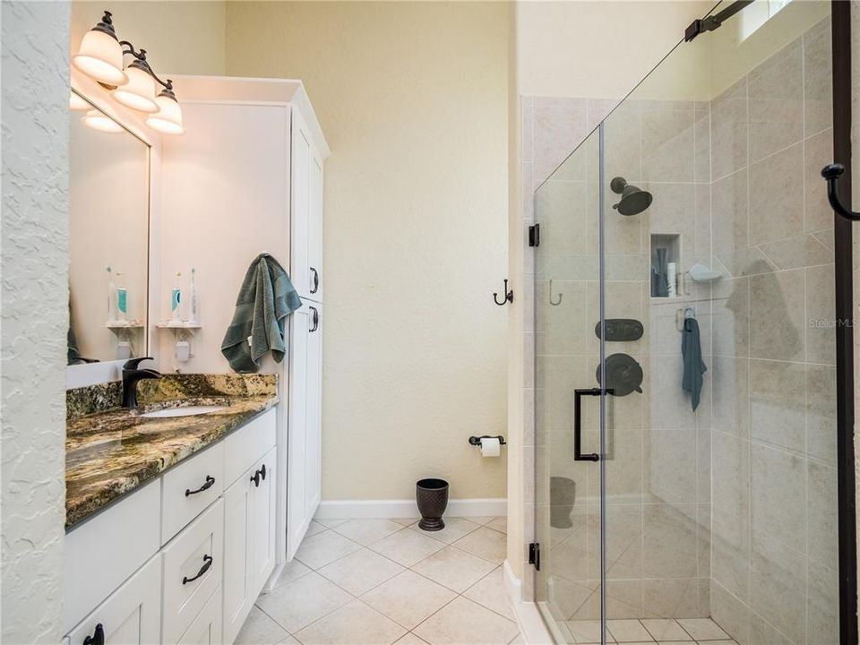 MASTER BATHROOM WITH EXTRA CABINETS STORAGE-LARGE WALK IN SHOWER DOUBLE HEADS