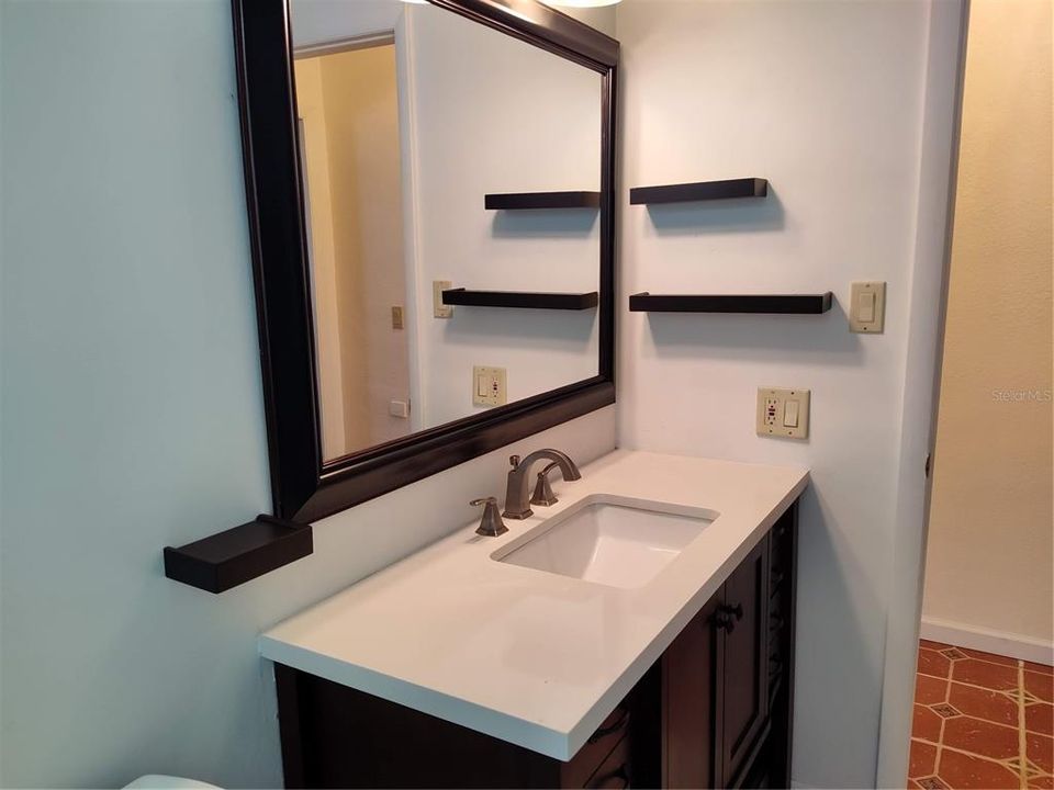 New vanity and mirror in Main bathroom