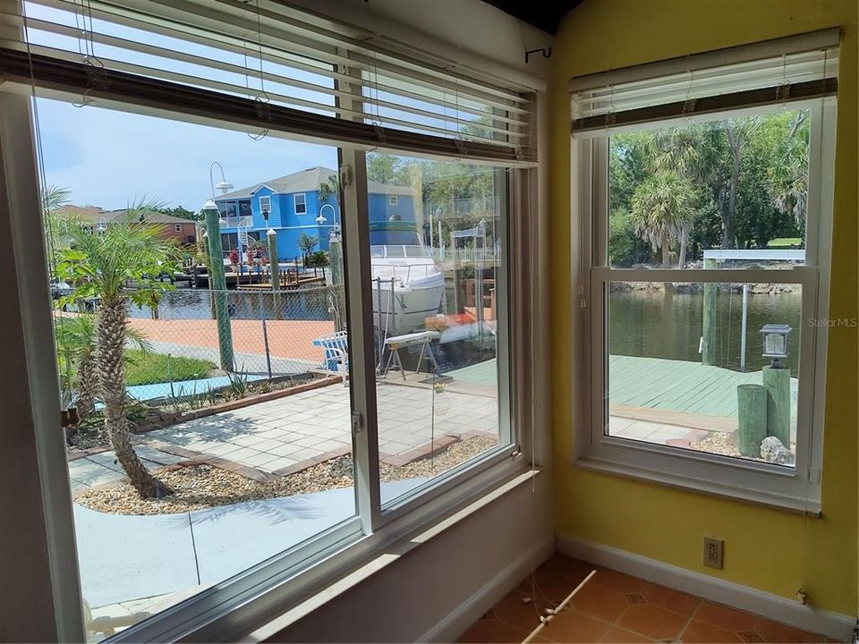 Beautiful view of your canal in the family room through the new vinyl windows.