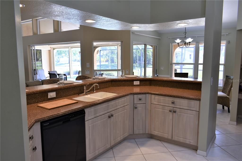 OPEN KITCHEN WITH CORIAN COUNTERS