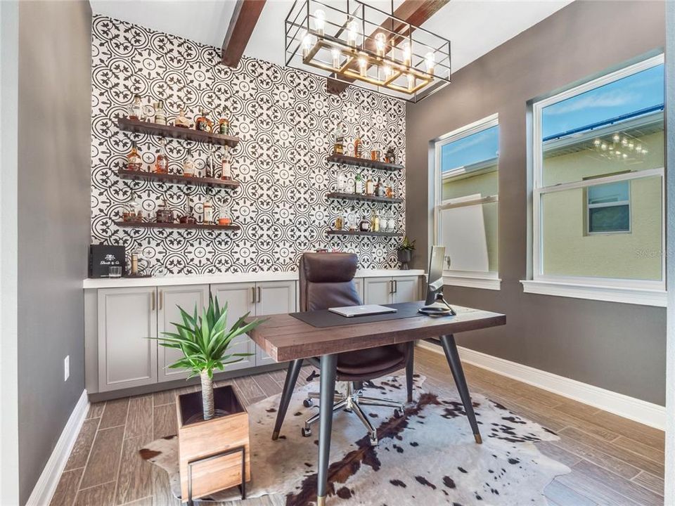 Perfect home office space with 2 bar doors for when privacy is needed
