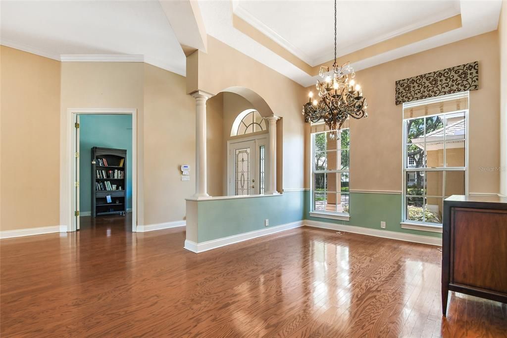 Awesome open floor plan! Lots of bedrooms PLUS an office PLUS a huge bonus room! Tons of space! Enjoy this luxury chandelier Enjoy the hardwood floors, crown molding, and more!