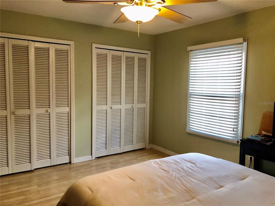 Spacious bedroom w/ double closets converted into Walk-in's