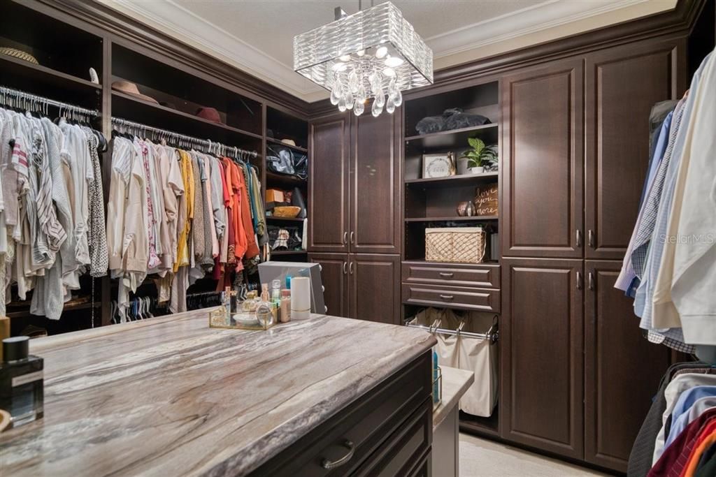 CUSTOM OVERSIZED MASTER CLOSET WITH BUILT IN CABINETRY