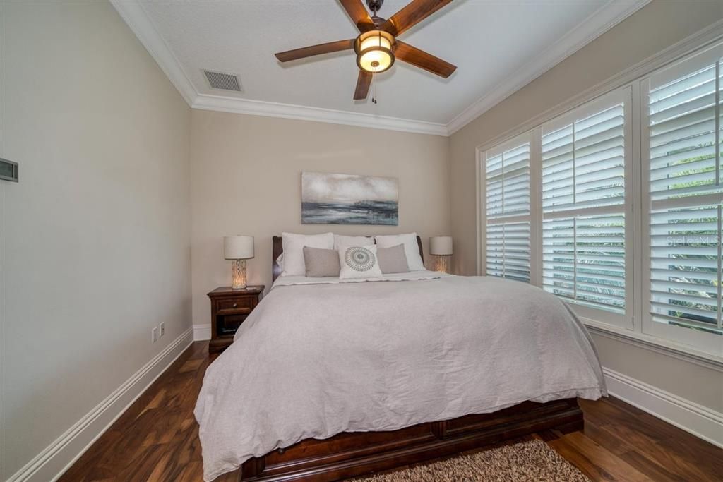 GUEST BEDROOM WITH PLANTATION SHUTTERS