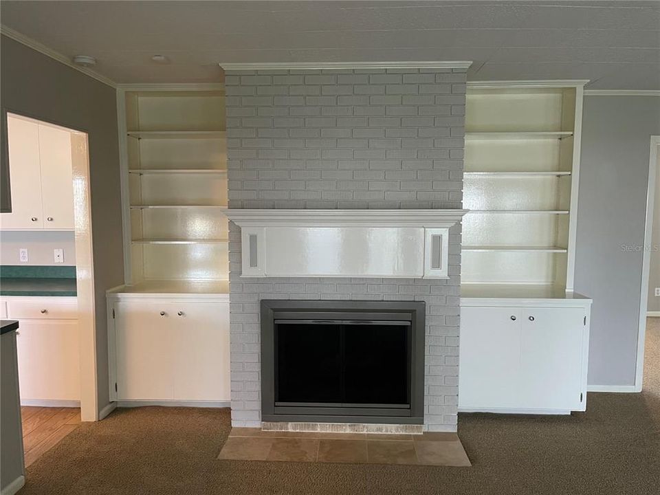 built ins and fireplace in the family room