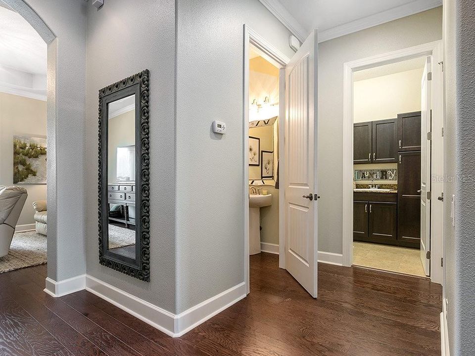 Large laundry room and convenient powder room.