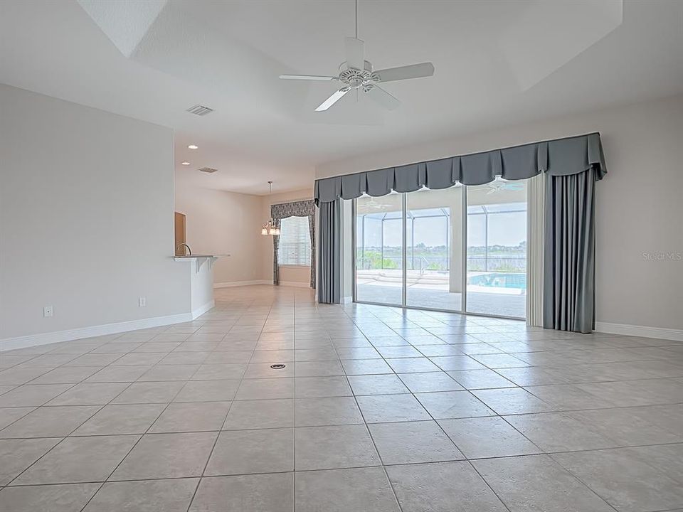 VIEW LOOKING BACK TOWARDS THE FORMAL DINING ROOM,FOYER AND DEN.