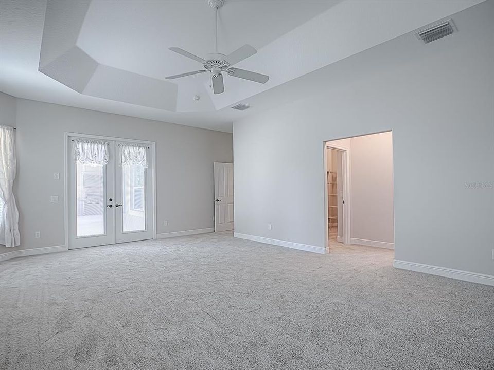 MASTERBEDROOM LOOKING TOWARD THE ENSUITE BATH.