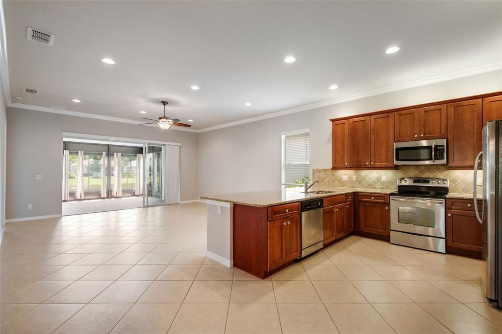 BEAUTIFUL OPEN AREA SHOWING KITCHEN AND GREAT ROOM