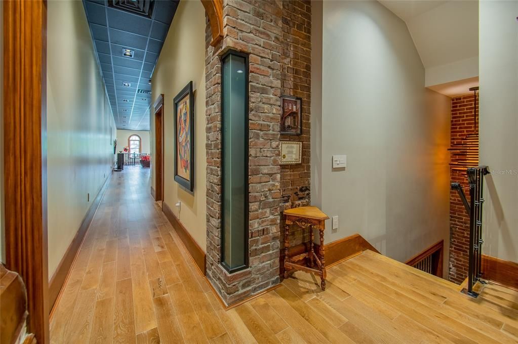 This area of the home has LED ambient lighting in the wall next to the back staircase and elevator.