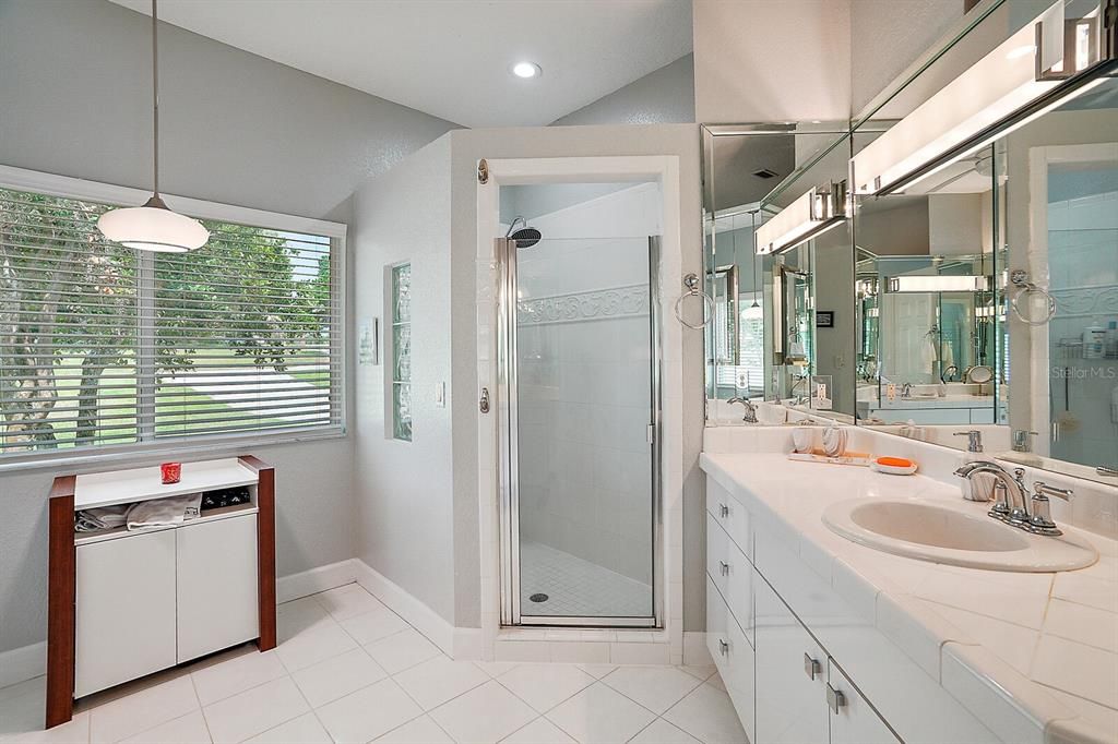 Dual sinks and walk-in shower