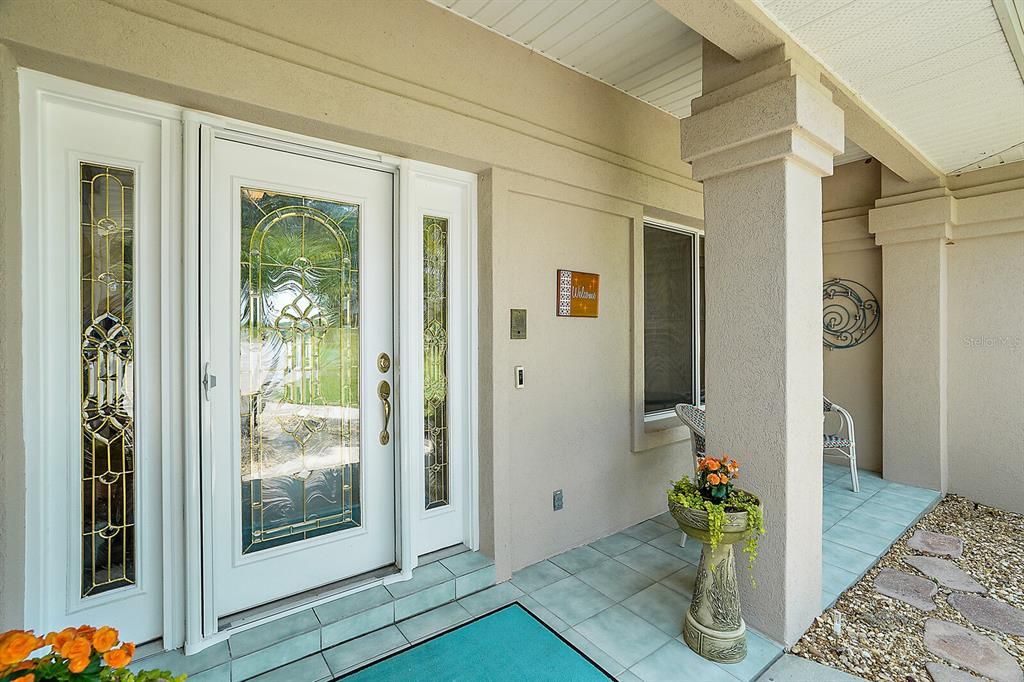 Welcome home to this beauty! Enjoy the covered front porch and leaded doors