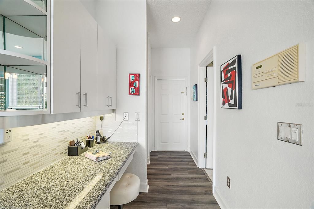 Desk space off the kitchen.  Access to the laundry room and garage