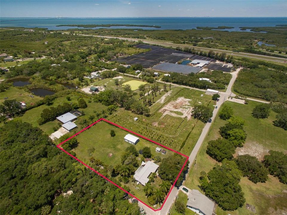 This property features almost 2 Acres on exclusive Terra Ceia Island. The iconic Sunshine Skyway Bridge can be seen in the distance.