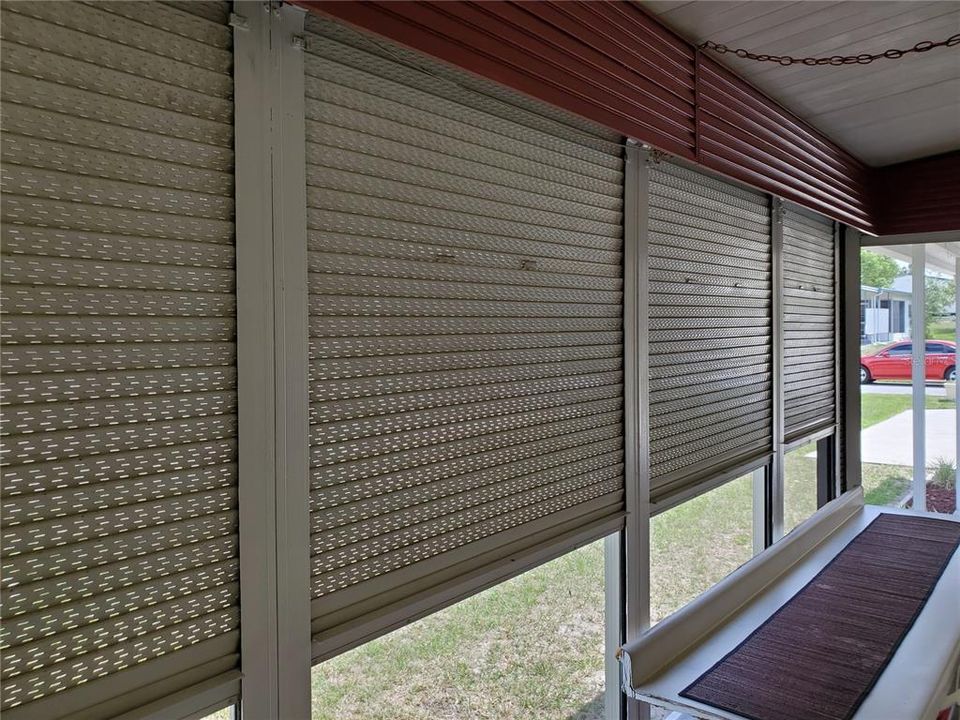Hurricane shutters in covered patio