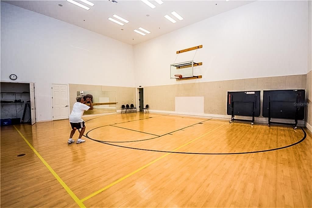 The Health and Fitness Center multi-purpose room gets lots of use for basketball, volleyball, ping pong, and small group fitness classes. The door to the indoor racquetball court is in the background.