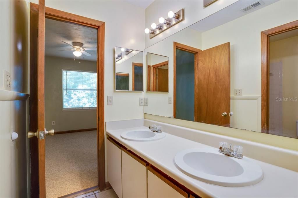 Upstairs Jack-and-Jill bath with double vanity