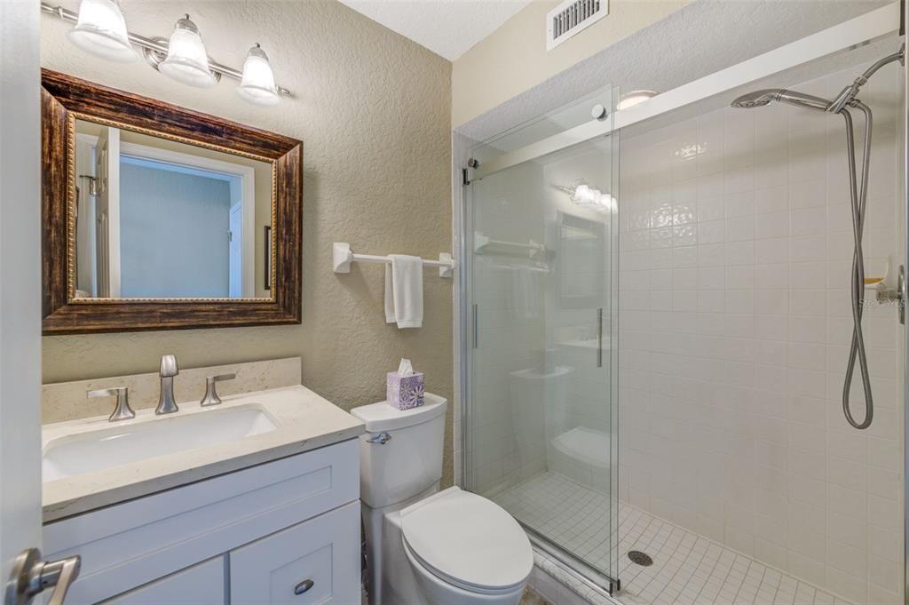 The first-floor family room has its own ensuite full bath.