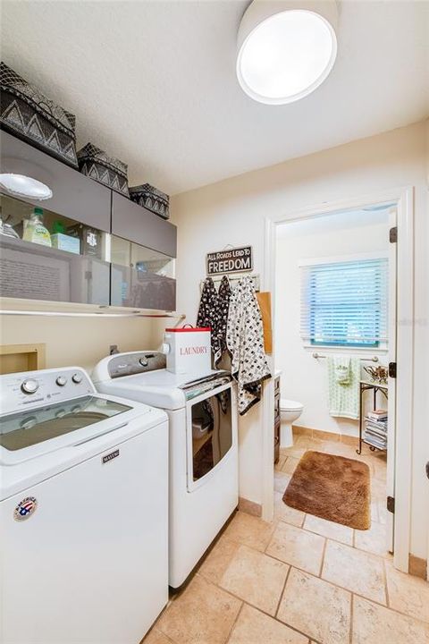 Laundry room with large linen closet/storage