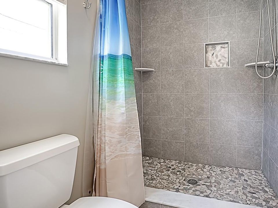 Beautifully Tiled Master Shower.