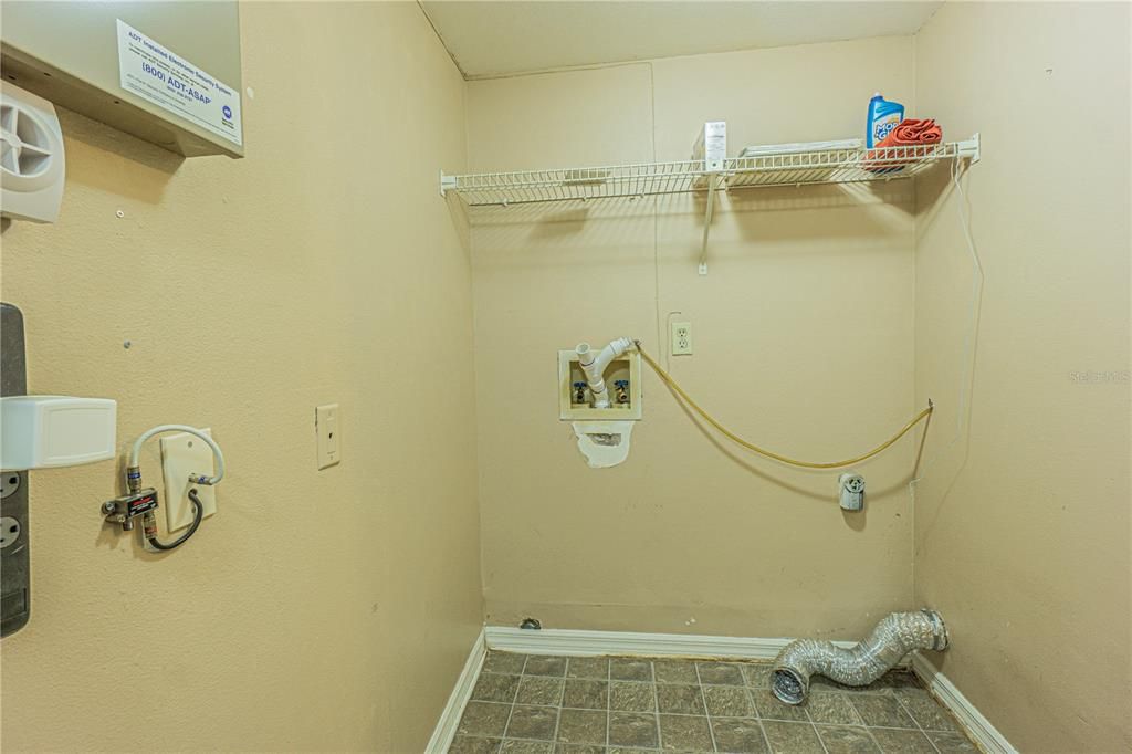 Indoor downstairs laundry room.