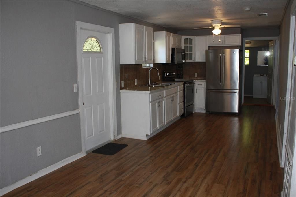 Entry the front door or carport door into your living room and kitchen