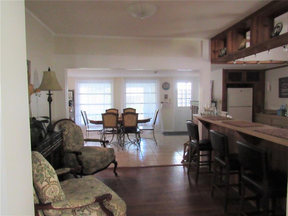 view from dining and kitchen area toward back family room
