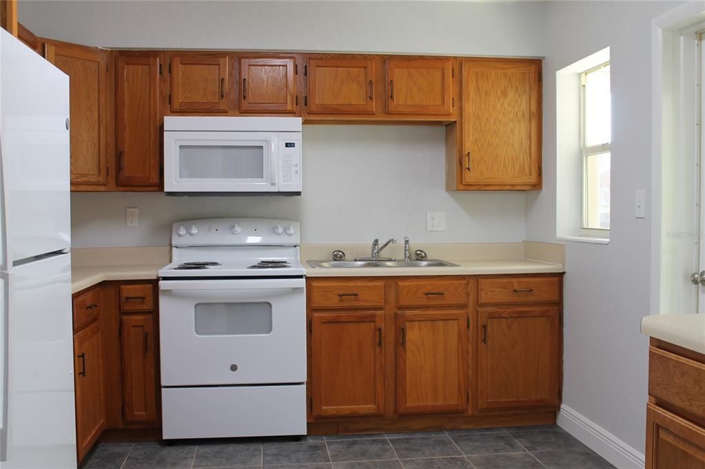 Large kitchen with new appliances. Lots of cabinet space.
