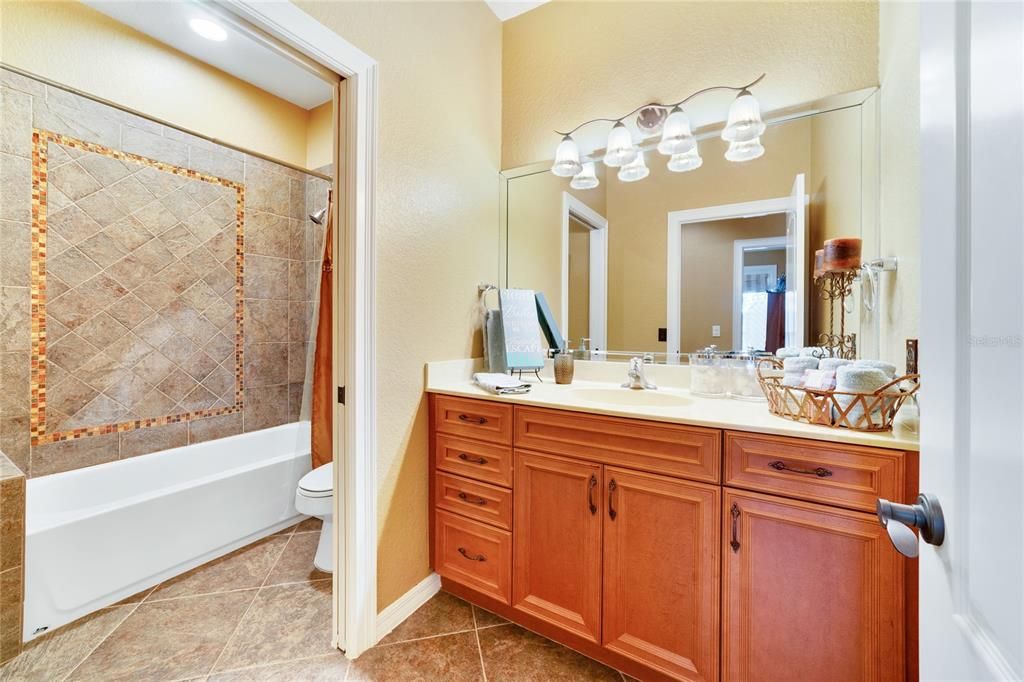 Two upstairs bedrooms share this bathroom.