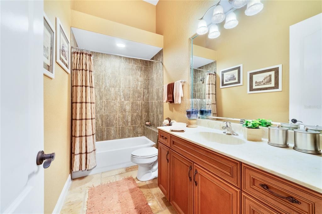 Secondary downstairs bedroom has access to this bathroom just outside the bedroom.