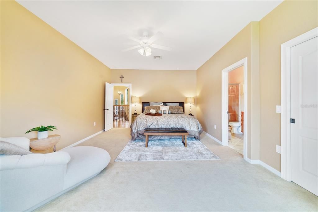 Alternate view of upstairs bedroom with ensuite bathroom and walk in closet.