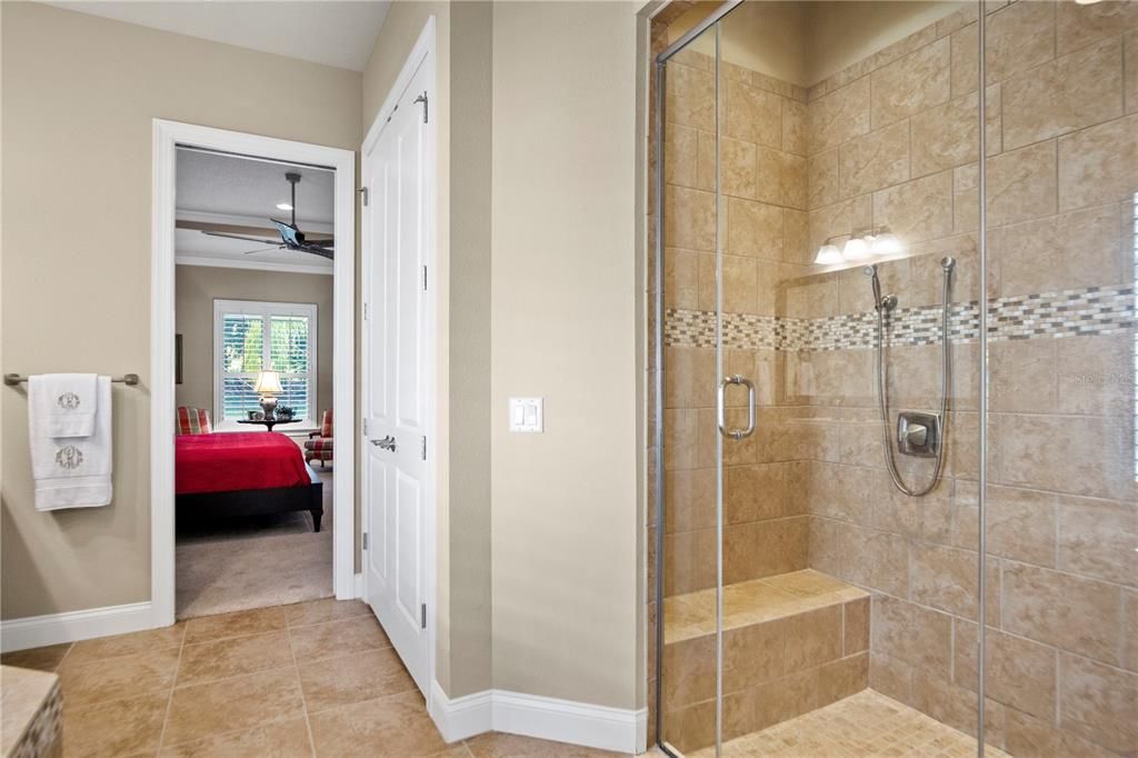 Master bath has a separate shower and the beauty of tile with lestello and glass entry.