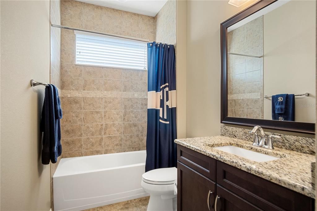 This bathroom is shared by two bedrooms.