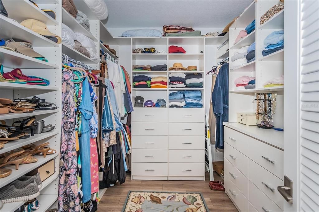 Walk-in Master Closet with organizing system.