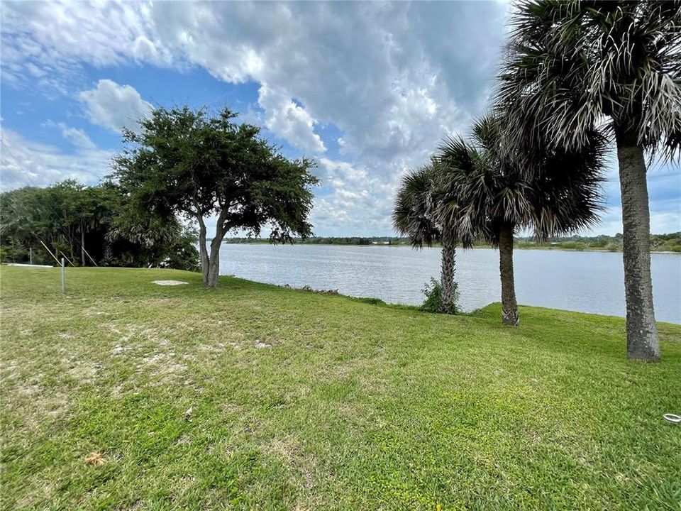 South view from included Riverfront Lot (just across the street), waiting for your own Boat Dock