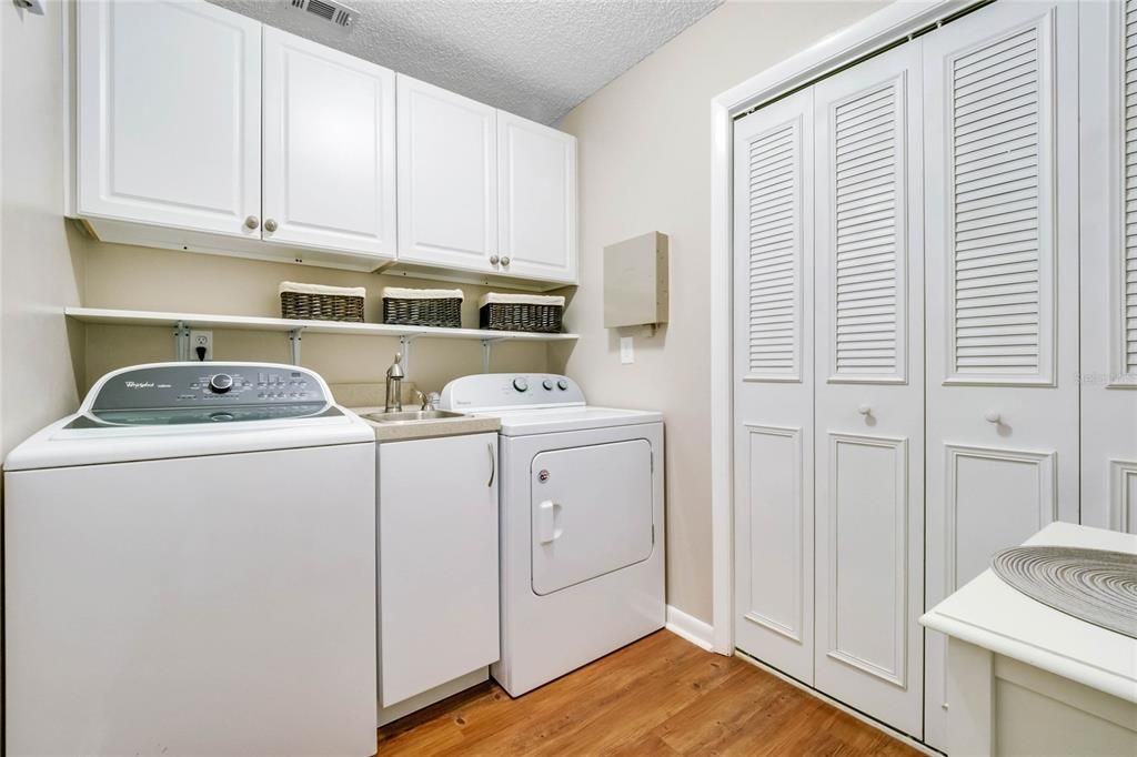 Laundry Room with sink and lots of storage