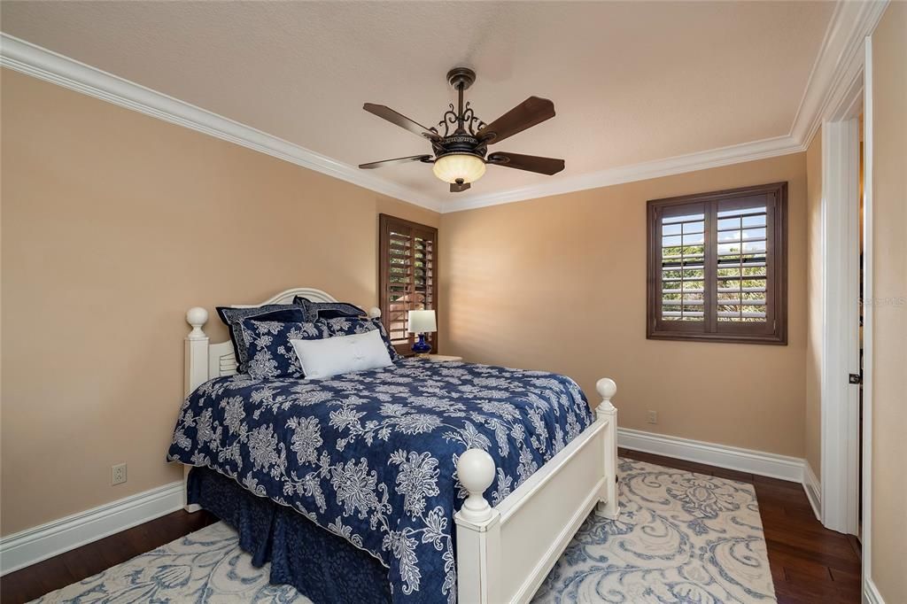 Guests will love this bedroom suite off of the second story bonus room.